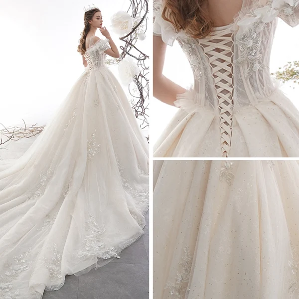 Schöne Champagner Brautkleider / Hochzeitskleider 2019 A Linie Off Shoulder Kurze Ärmel Rückenfreies Applikationen Spitze Pailletten Glanz Tülle Kathedrale Schleppe Rüschen