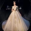 Luxe Champagne Transparentes Robe De Mariée 2019 Princesse Col v profond Manches Courtes Perlage Gland Dos Nu Appliques En Dentelle Cathedral Train Volants
