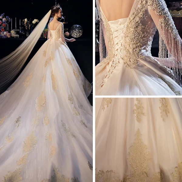 Luxe Champagne Transparentes Robe De Mariée 2019 Princesse Col v profond Manches Courtes Perlage Gland Dos Nu Appliques En Dentelle Cathedral Train Volants
