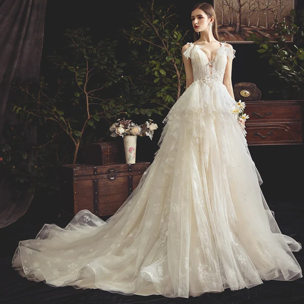 Chic / Beautiful Champagne Wedding Dresses 2019 A-Line / Princess See-through Deep V-Neck Sleeveless Backless Appliques Lace Beading Court Train Ruffle