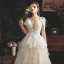 Chic / Beautiful Champagne Wedding Dresses 2019 A-Line / Princess See-through Deep V-Neck Sleeveless Backless Appliques Lace Beading Court Train Ruffle