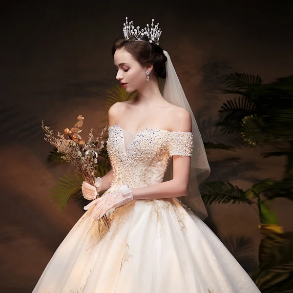 Luxury / Gorgeous Champagne Wedding Dresses 2019 Ball Gown Off-The-Shoulder Short Sleeve Backless Appliques Lace Handmade Beading Pearl Chapel Train Ruffle