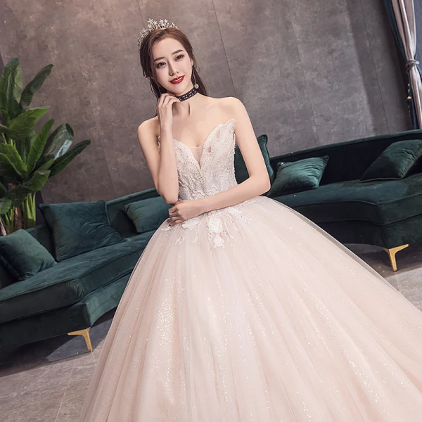 Sjarmerende Champagne Korsett Brudekjoler 2019 Prinsesse Kjæreste Uten Ermer Ryggløse Appliques Blonder Beading Glitter Tyll Cathedral Train