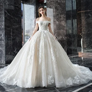 Luxe Champagne Robe De Mariée 2019 Robe Boule De L 039 Épaule Manches Courtes Dos Nu Appliques En Dentelle Paillettes Perlage Perle Glitter Tulle Cathedral Train Volants