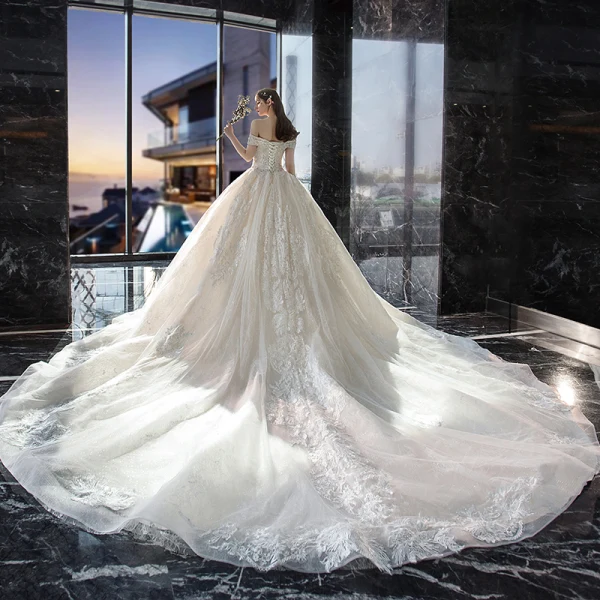 Luxury / Gorgeous Champagne Wedding Dresses 2019 Ball Gown Off-The-Shoulder Short Sleeve Backless Appliques Lace Sequins Beading Pearl Glitter Tulle Cathedral Train Ruffle