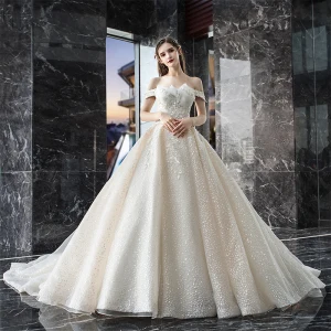 Bling Bling Champagne Robe De Mariée 2019 Princesse De L 039 Épaule Manches Courtes Dos Nu Appliques En Dentelle Paillettes Perlage Glitter Tulle Cathedral Train Volants