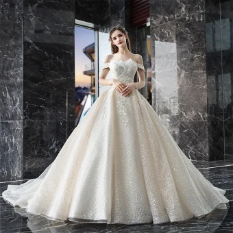 Bling Bling Champagne Wedding Dresses 2019 A Line Princess Off The Shoulder Short Sleeve Backless Appliques Lace Sequins Beading Glitter Tulle Cathedral Train Ruffle