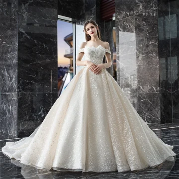 Bling Bling Champagne Wedding Dresses 2019 A Line Princess Off The Shoulder Short Sleeve Backless Appliques Lace Sequins Beading Glitter Tulle Cathedral Train Ruffle