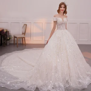 Bling Bling Champagne Wedding Dresses 2019 A Line Princess Off The Shoulder Short Sleeve Backless Appliques Lace Glitter Sequins Cathedral Train Ruffle
