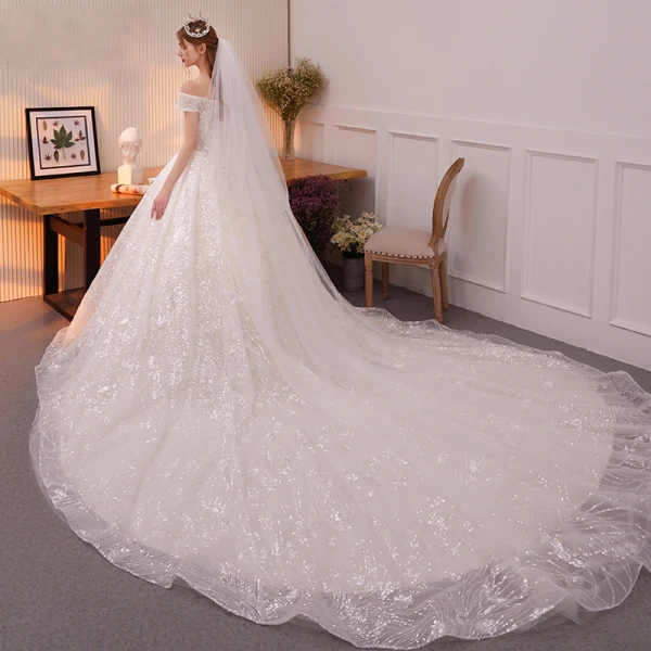 Bling Bling Champagne Robe De Mariée 2019 Princesse De l'épaule Manches Courtes Dos Nu Appliques En Dentelle Glitter Paillettes Cathedral Train Volants