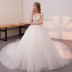 Bling Bling Ivoire Transparentes Robe De Mariée 2019 Princesse Encolure Dégagée Sans Manches Dos Nu Glitter Paillettes Cathedral Train Volants