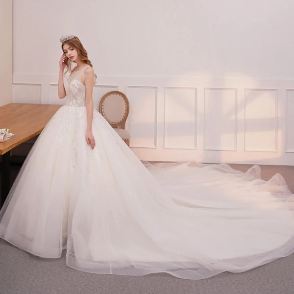 Bling Bling Ivory / Creme Durchsichtige Brautkleider / Hochzeitskleider 2019 A Linie Rundhalsausschnitt Ärmellos Rückenfreies Glanz Pailletten Kathedrale Schleppe Rüschen