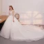 Bling Bling Ivory / Creme Durchsichtige Brautkleider / Hochzeitskleider 2019 A Linie Rundhalsausschnitt Ärmellos Rückenfreies Glanz Pailletten Kathedrale Schleppe Rüschen