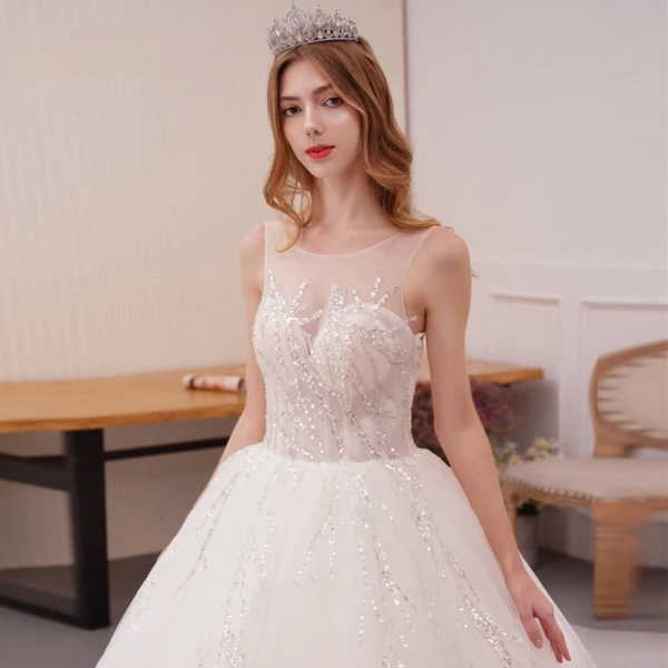 Bling Bling Ivory / Creme Durchsichtige Brautkleider / Hochzeitskleider 2019 A Linie Rundhalsausschnitt Ärmellos Rückenfreies Glanz Pailletten Kathedrale Schleppe Rüschen