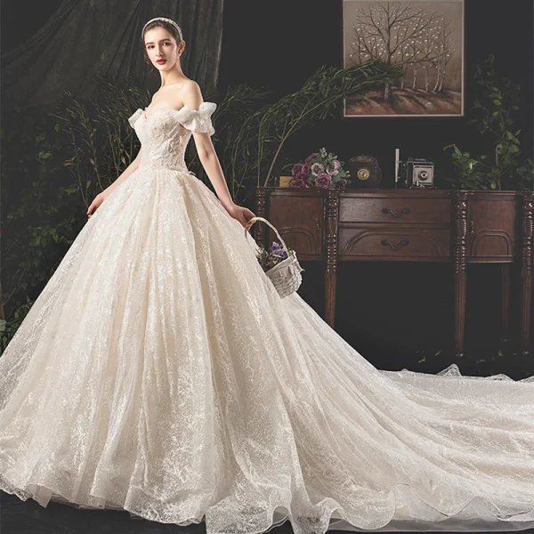 Beste Champagner Brautkleider / Hochzeitskleider 2019 Ballkleid Off Shoulder Schleife Kurze Ärmel Rückenfreies Applikationen Spitze Perlenstickerei Perle Pailletten Glanz Tülle Königliche Schleppe Rüschen