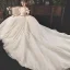 Beste Champagner Brautkleider / Hochzeitskleider 2019 Ballkleid Off Shoulder Schleife Kurze Ärmel Rückenfreies Applikationen Spitze Perlenstickerei Perle Pailletten Glanz Tülle Königliche Schleppe Rüschen