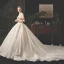 Vintage / Originale Champagne Robe De Mariée 2019 Princesse Transparentes Col v profond Manches Courtes Forme de coeur Dos Nu Appliques En Dentelle Perlage Glitter Tulle Cathedral Train Volants