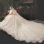 Vintage / Originale Champagne Robe De Mariée 2019 Princesse Transparentes Col v profond Manches Courtes Forme de coeur Dos Nu Appliques En Dentelle Perlage Glitter Tulle Cathedral Train Volants