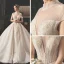 Vintage / Originale Champagne Robe De Mariée 2019 Princesse Transparentes Col v profond Manches Courtes Forme de coeur Dos Nu Appliques En Dentelle Perlage Glitter Tulle Cathedral Train Volants