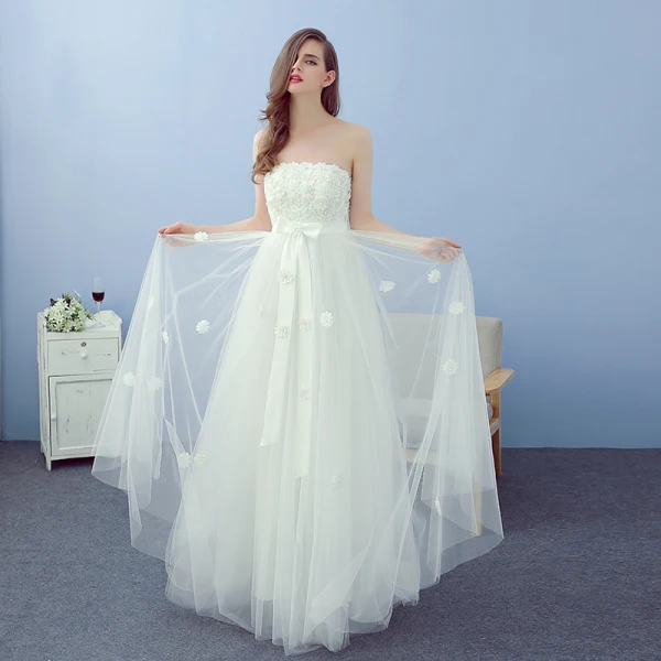 Abordable Ivoire Plage Robe De Mariée 2019 Princesse Bustier Sans Manches Dos Nu Appliques En Dentelle Fleur Perle Noeud Ceinture Longue Volants