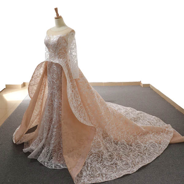 Atemberaubend Champagner Durchsichtige Brautkleider / Hochzeitskleider 2019 Meerjungfrau Rundhalsausschnitt Lange Ärmel Rückenfreies Glanz Applikationen Spitze Kapelle-Schleppe Rüschen