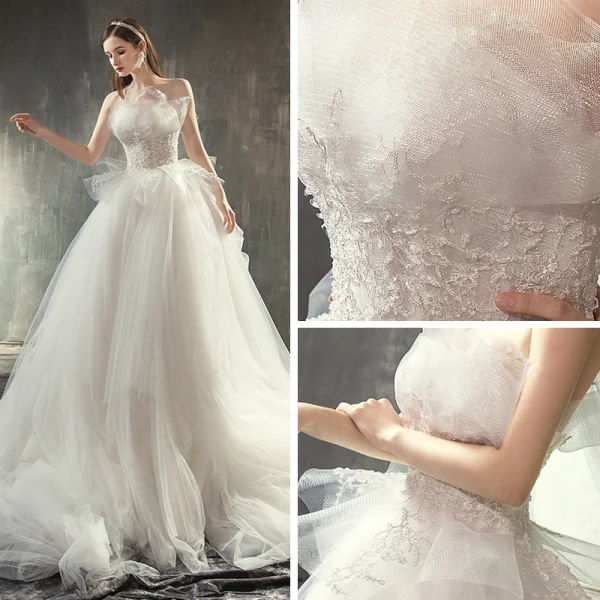 Edles Brautkleider / Hochzeitskleider 2019 Prinzessin Bandeau Ärmellos Rückenfreies Applikationen Spitze Kathedrale Schleppe Rüschen Champagner Ivory / Creme