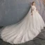 Schöne Champagner Durchsichtige Brautkleider / Hochzeitskleider 2019 A Linie Rundhalsausschnitt Kurze Ärmel Perlenstickerei Quaste Rückenfreies Applikationen Spitze Kapelle-Schleppe Rüschen