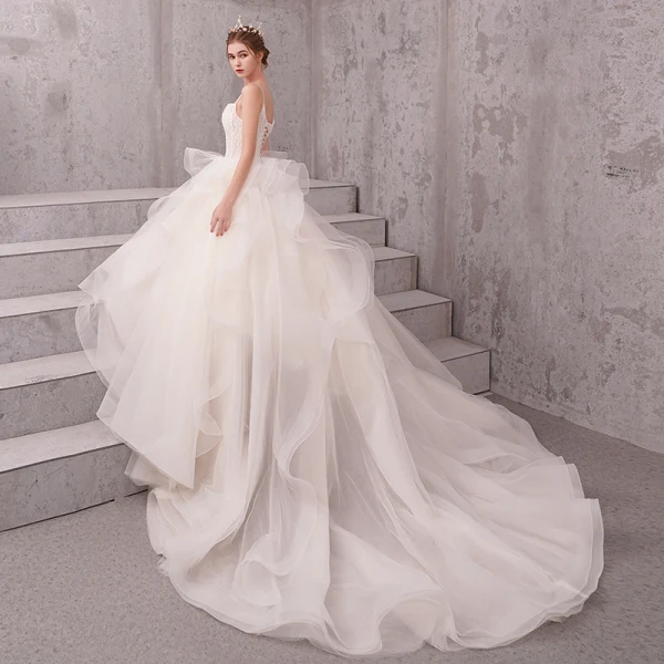 Schöne Ivory / Creme Brautkleider / Hochzeitskleider 2019 A Linie Perlenstickerei Perle Spaghettiträger Ärmellos Rückenfreies Applikationen Spitze Kapelle-Schleppe Rüschen