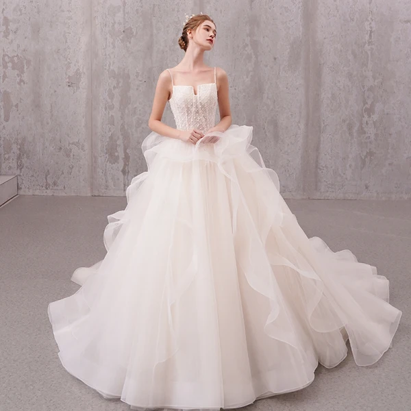Schöne Ivory / Creme Brautkleider / Hochzeitskleider 2019 A Linie Perlenstickerei Perle Spaghettiträger Ärmellos Rückenfreies Applikationen Spitze Kapelle-Schleppe Rüschen