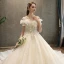 Chic Champagne Robe De Mariée 2019 Princesse V-Cou Manches Courtes Dos Nu Appliques En Dentelle Paillettes Perlage Glitter Tulle Chapel Train Volants