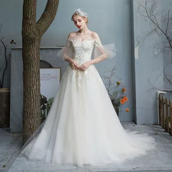 Abordable Champagne Jardin Extérieur Robe De Mariée 2019 Princesse De L 039 Épaule Manches De Cloche Dos Nu Appliques En Dentelle Paillettes Perlage Perle Train De Balayage Volants