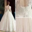 Luxury / Gorgeous Ivory See-through Wedding Dresses 2019 A-Line / Princess Scoop Neck 3/4 Sleeve Backless Appliques Lace Beading Crystal Glitter Tulle Floor-Length / Long Ruffle