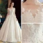 Luxury / Gorgeous Ivory See-through Wedding Dresses 2019 A-Line / Princess Scoop Neck 3/4 Sleeve Backless Appliques Lace Beading Crystal Glitter Tulle Floor-Length / Long Ruffle