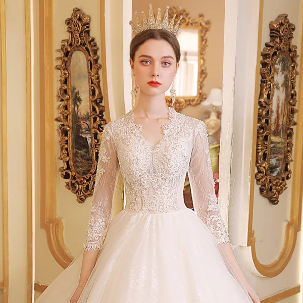 Élégant Ivoire Robe De Mariée 2019 Princesse V-Cou Transparentes 3/4 Manches Appliques En Dentelle Perlage Chapel Train Volants