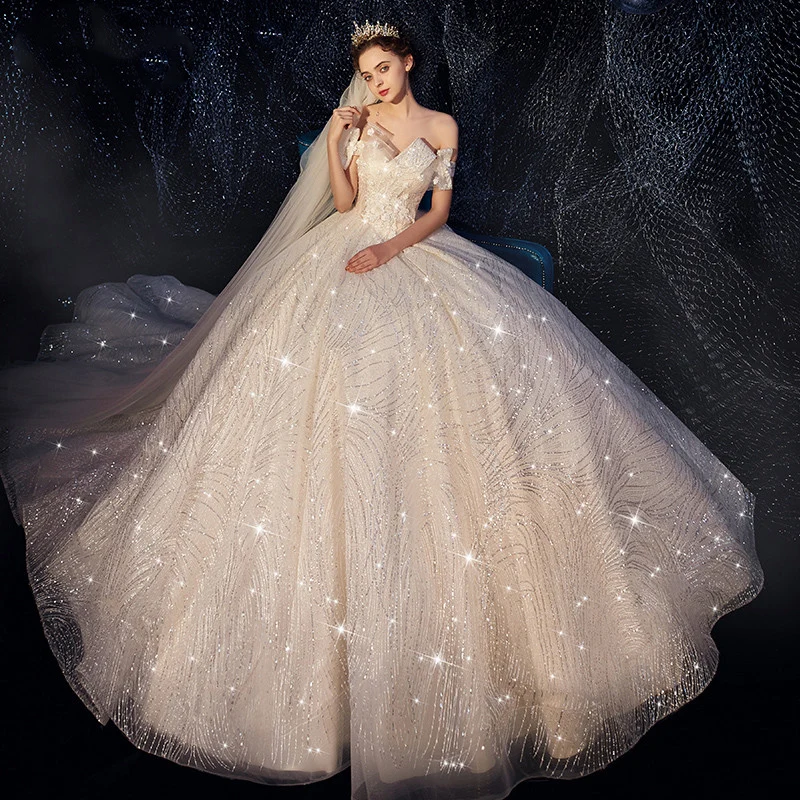 Bling Bling Champagne Wedding Dresses 2019 A Line Princess Off The Shoulder  Short Sleeve Backless Appliques Lace Sequins Beading Pearl Glitter Tulle  Chapel Train Ruffle
