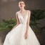 Schöne Ivory / Creme Brautkleider / Hochzeitskleider 2019 A Linie Durchsichtige V-Ausschnitt Ärmellos Rückenfreies Applikationen Spitze Pailletten Perlenstickerei Kapelle-Schleppe Rüschen