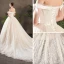 Chic Champagne Robe De Mariée 2019 Princesse De l'épaule Noeud Manches Courtes Dos Nu Glitter Appliques En Dentelle Chapel Train Volants