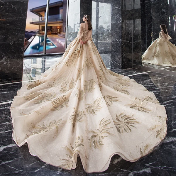 Étourdissant Champagne Robe De Mariée 2019 Princesse De l'épaule Gonflée 3/4 Manches Dos Nu Perlage Glitter Tulle Royal Train Volants