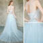 Élégant Bleu Ciel Transparentes Robe De Soirée 2019 Princesse Encolure Dégagée Sans Manches Appliques En Dentelle Plumes Perlage Perle Train De Balayage Volants Dos Nu Robe De Ceremonie