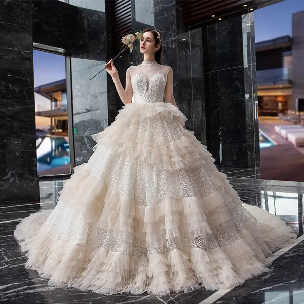 Fabulous Champagne Glitter Lace Wedding Dresses 2019 Ball Gown See-through High Neck Sleeveless Backless Beading Cathedral Train Ruffle