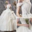 Abordable Champagne Jardin / Extérieur Robe De Mariée 2019 Robe Boule De l'épaule Manches Courtes Dos Nu Appliques En Dentelle Paillettes Longue Volants