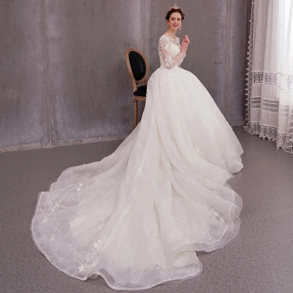 Flower Fairy Ivory See-through Wedding Dresses 2019 Ball Gown Scoop Neck Long Sleeve Backless Appliques Flower Beading Pearl Glitter Tulle Chapel Train Ruffle