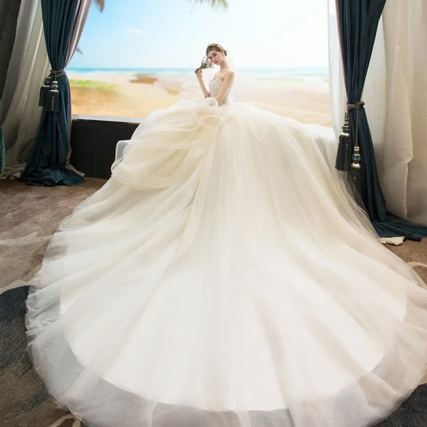 Beste Champagne Brudekjoler 2019 Ballkjole Kjæreste Uten Ermer Ryggløse Appliques Blonder Beading Chapel Train Buste