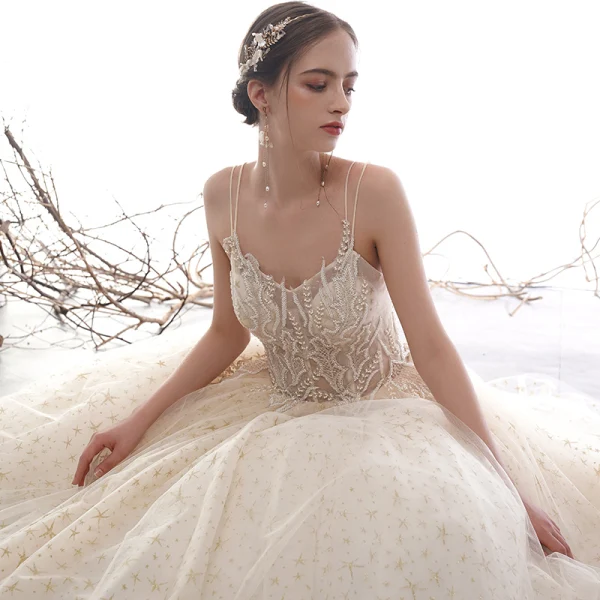 Élégant Champagne Robe De Mariée 2019 Princesse Bretelles Spaghetti Dos Nu Perlage Sans Manches Glitter Étoile Tulle Longue Volants