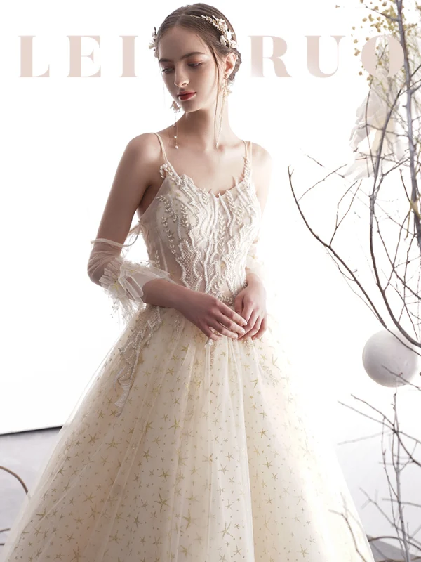 Élégant Champagne Robe De Mariée 2019 Princesse Bretelles Spaghetti Dos Nu Perlage Sans Manches Glitter Étoile Tulle Longue Volants