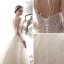 Élégant Champagne Robe De Mariée 2019 Princesse Bretelles Spaghetti Dos Nu Perlage Sans Manches Glitter Étoile Tulle Longue Volants