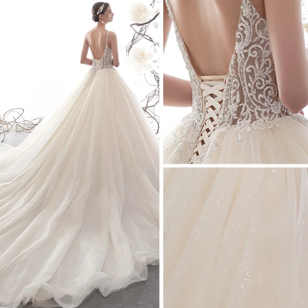 Illusion Champagner Durchbohrt Brautkleider / Hochzeitskleider 2019 A Linie Spaghettiträger Rückenfreies Ärmellos Handgefertigt Perlenstickerei Glanz Tülle Kathedrale Schleppe