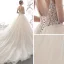 Illusion Champagner Durchbohrt Brautkleider / Hochzeitskleider 2019 A Linie Spaghettiträger Rückenfreies Ärmellos Handgefertigt Perlenstickerei Glanz Tülle Kathedrale Schleppe