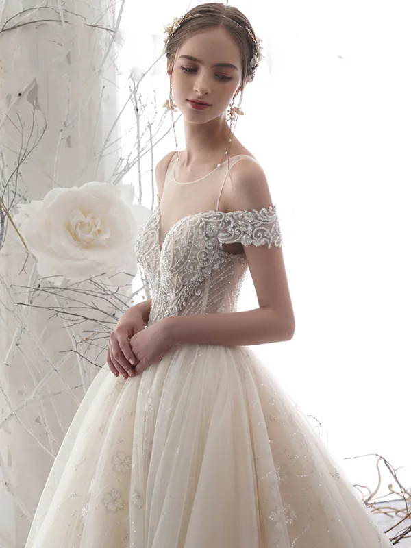Luxury / Gorgeous Champagne See-through Wedding Dresses 2019 A-Line / Princess Scoop Neck Short Sleeve Backless Pierced Handmade Beading Glitter Tulle Cathedral Train Ruffle