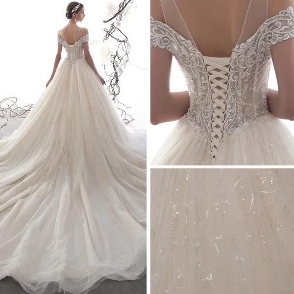 Luxury / Gorgeous Champagne See-through Wedding Dresses 2019 A-Line / Princess Scoop Neck Short Sleeve Backless Pierced Handmade Beading Glitter Tulle Cathedral Train Ruffle
